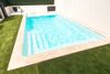 PISCINE COQUE POLYESTER AVEC COUVERTURE AUTOMATIQUE EN FOND ET BANQUETTE