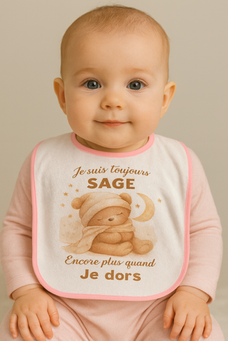 Bavoir rose "Je suis toujours sage… encore plus quand je dors" 