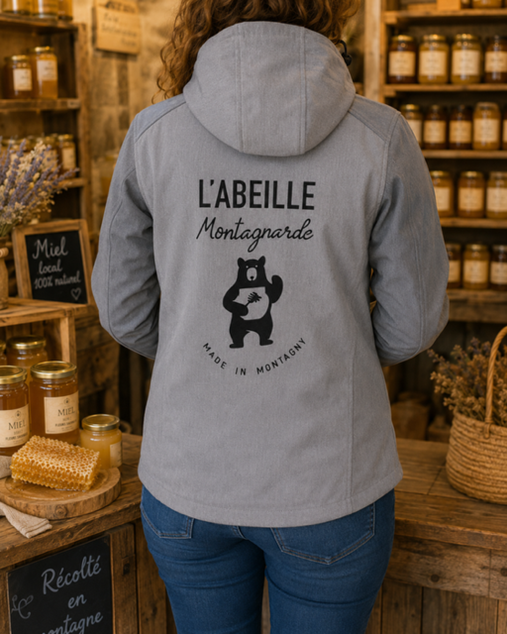 Blouson softshelle gris avec capuche et logo dans le dos